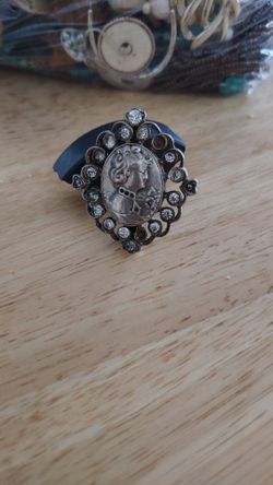 Vintage Sterling Silver broches ,has two stones missing