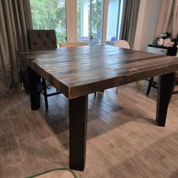 Tall Grey Distressed Wood Dining Table. 6 Upholstered Chairs