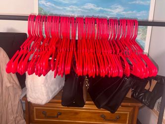 61 red adult plastic hangers
