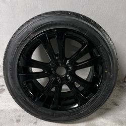 One Rim With New Tire From Chrysler 200