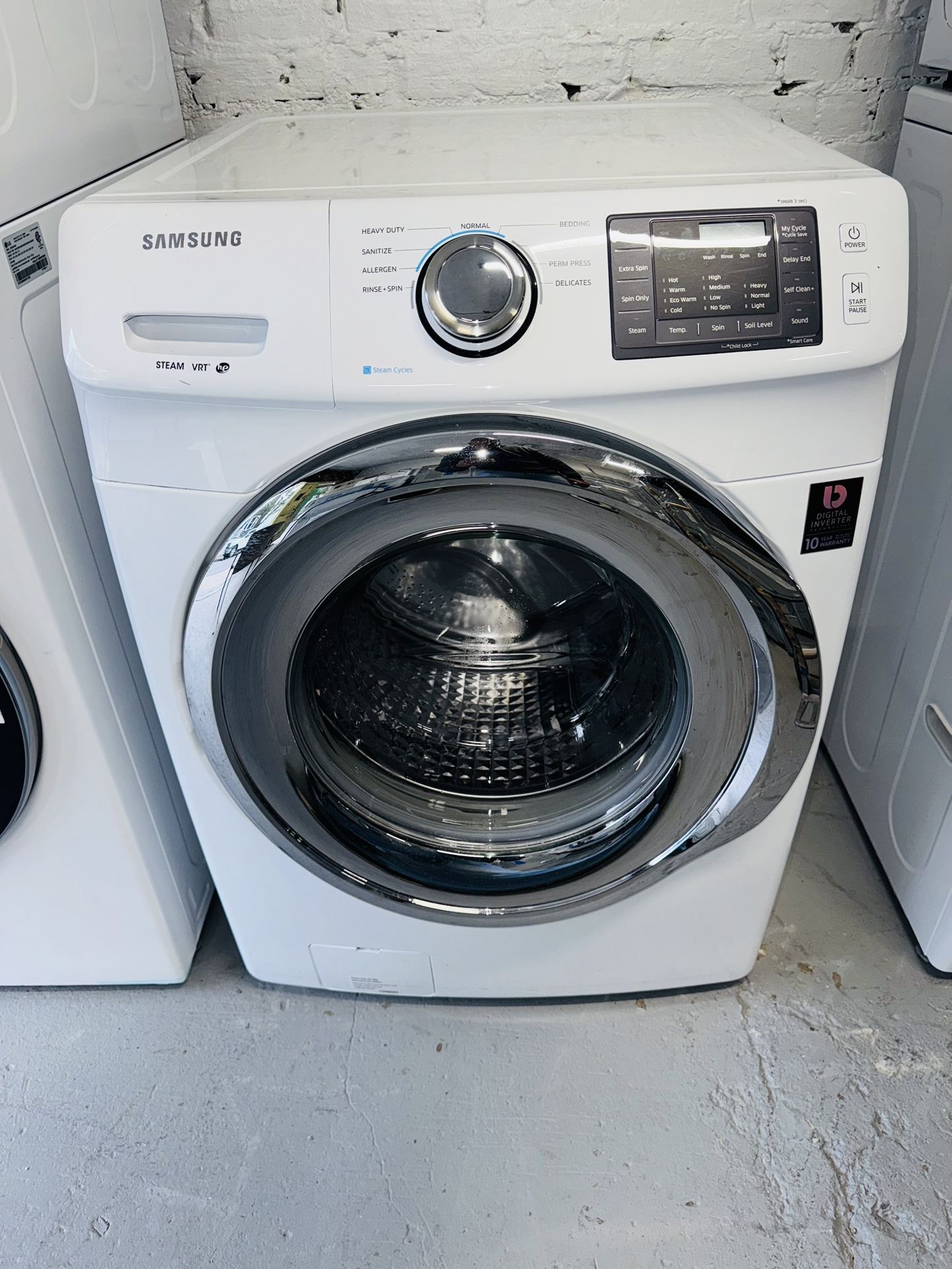 Samsung white washing machine, a receipt for a 60-day warranty