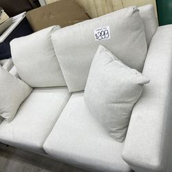 White fabric loveseat sofa