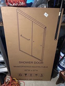 Semi frameless tub shower door