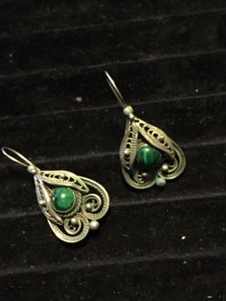 Two sets of very old custom made silver earrings very unique