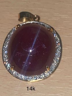 14k diamond ruby pendant.