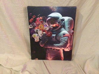 Astronaut Holding Flowers Canvas Print - Modern Space Wall Art