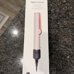 Pink. Dyson Airstrait 