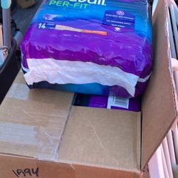 Boxes Of Diapers And Disposable Chucks
