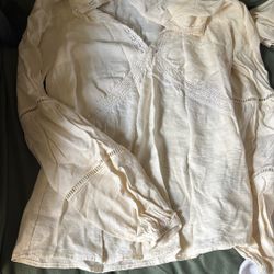 Women’s long sleeve top with embellishments