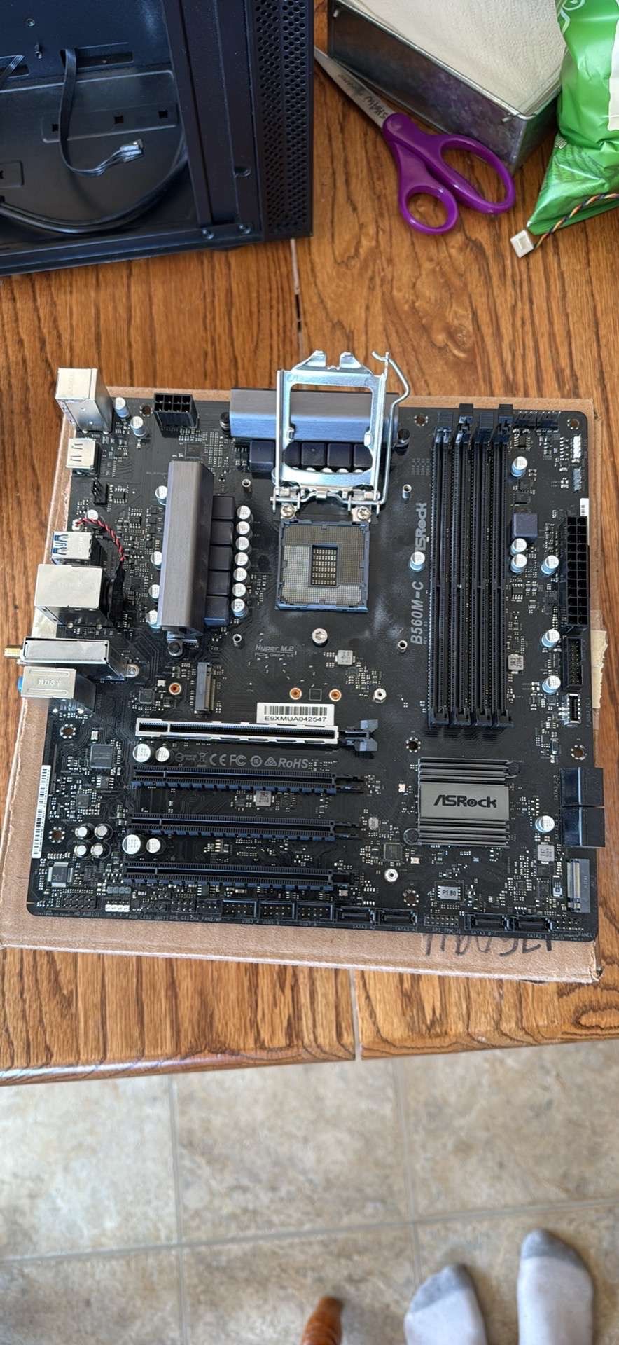 Asrock B560M-C Motherboard.