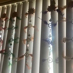 Hanging art with feathers