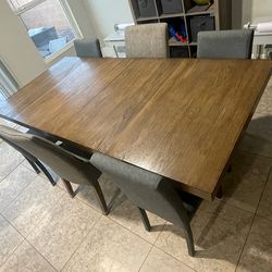 Large dining room table and chairs