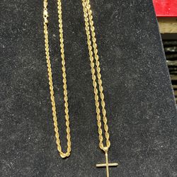 Hallow rope chains with cross pendant 10k gold