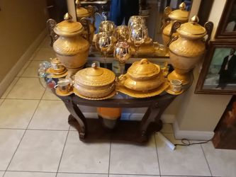 Brown wooden table with a mirror glass