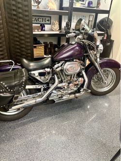 Beautiful 2001 1200 Sportster many extras runs well. 20,00 miles