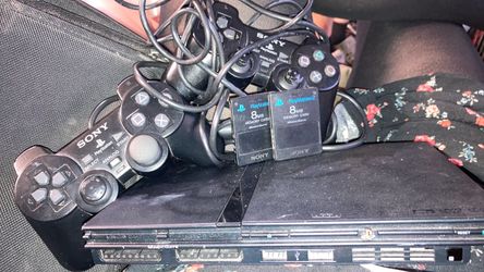 PlayStation 2 Slim Console Bundle with Controllers and Memory Cards