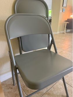 Set of two metal folding chairs like new - used for one evening dinner party - from Lowe’s