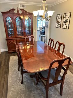 Queen Anne Style dining room furniture and hutch.