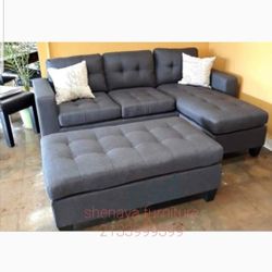 Gray Reversibke Sectional Sofa With Ottoman