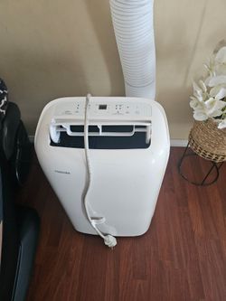 AC PORTABLE TOSHIBA 6000 BTU IS TOUCH SCREEN, SLEEP TIMER, MODE,WORKS GREAT YOU CAN TEST IT BEFORE PURCHASE FOR ANY QUESTION TEXT ME PLEASE