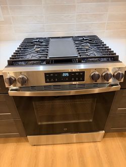 New open box ge 5 burners gas range stainless steel no dents or scratches