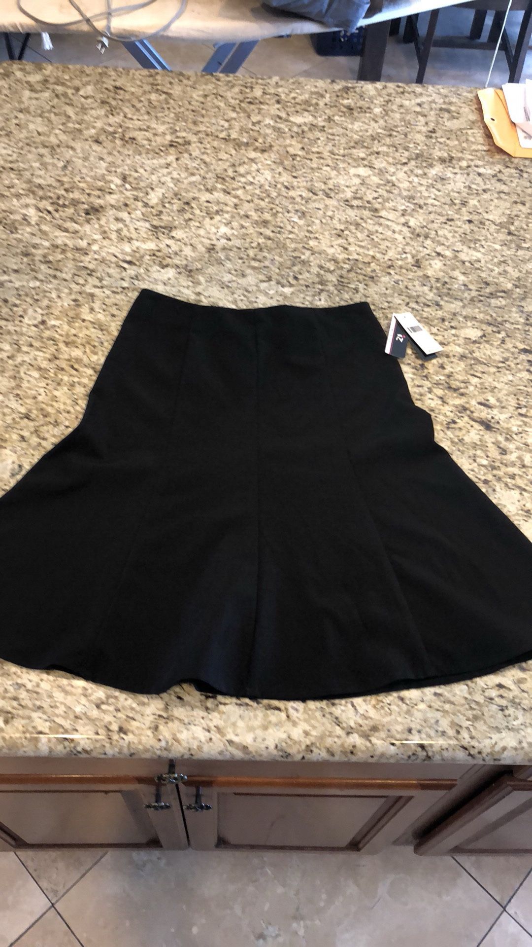New size 14 women’s black skirt with tags