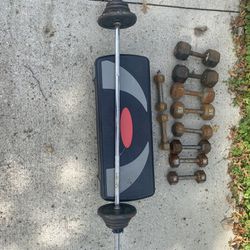 Set of dumbbells and barbell