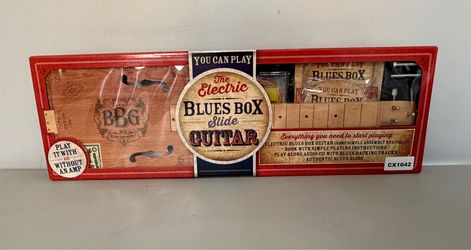 The electric blue box slide guitar NEW