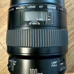 Canon 100 mm prime lens in excellent condition.