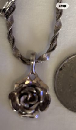 Sterling Silver Rose Pendant On Chain. 80.00