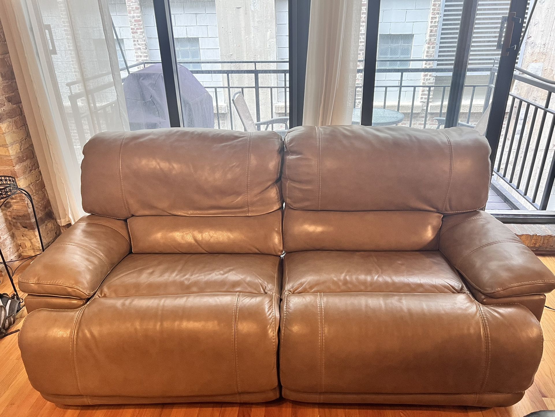 2 Seat Recliner Sofa In River North! Must Pick Up