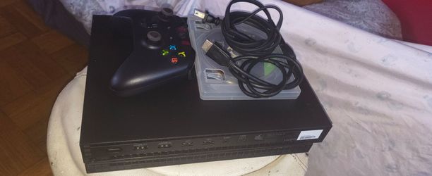 Restored XBOX ONE X 1TB EN/FR/ES US/CA X-VA, CYV-00411.     Includes :Star wars Jedi; FALLEN ORDER