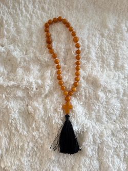 Butterscotch natural amber prayer beads with a tassel