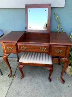 vintage American Drew cherry vanity with hinged mirror and stool.