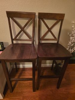 Brown wood barstools