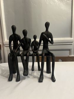 Family of 4 cast Iron Sculpture