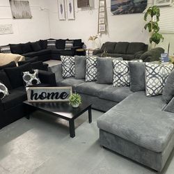 Grey Sectional With Designed Pillows 