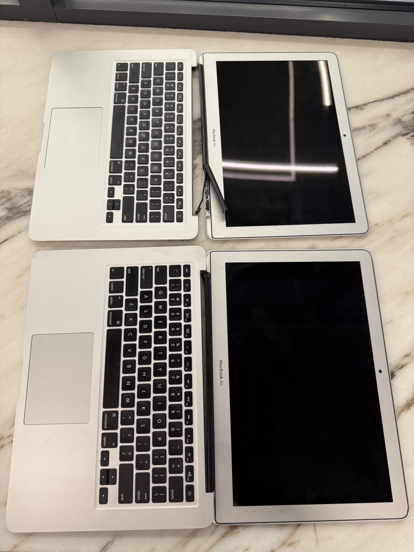 Two MacBook Airs FOR PARTS