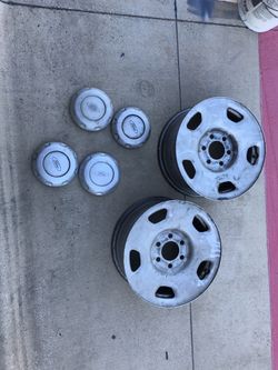 Ford F-150 wheels (2) and 4 center caps