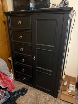 Tall black dresser/armoire