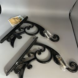 $10/pair.  Pair of steel 9” decorative hanging plant bracket.  Holds up to 45 lbs each.