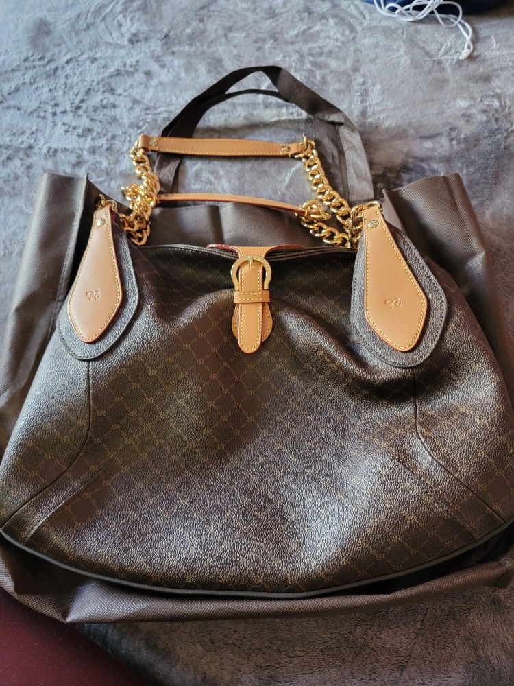 Rioni Purse Never Used