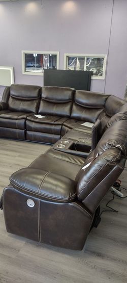 New sectional sofa with three power recliners on sale now