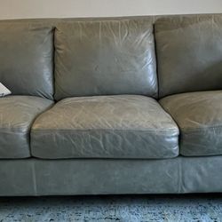 Soft Leather Sofa With 4 Decorative Down Pillows & Wing Back Studded Chair With Foot Rest/Back Cushion
