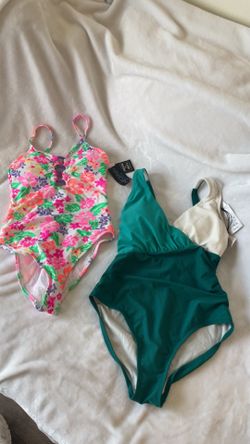 Swimming suits different styles and sizes. New with tags