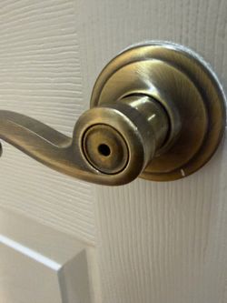 Kwikset Lido Antique Brass Interior and Privacy Door handles