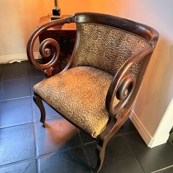 Regency style scroll arm mahogany chair in leopard