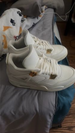 Air Jordan 4s retro white & gold