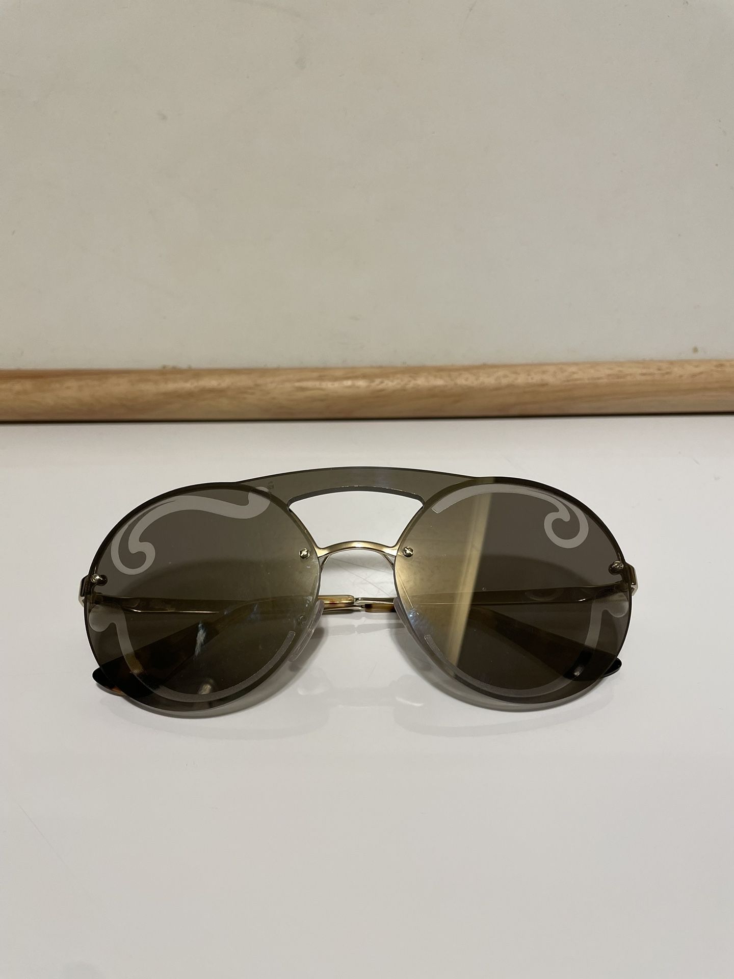 PRADA Sunglasses- 65TS Pale Gold Frame Unique Silver Mirror Lens