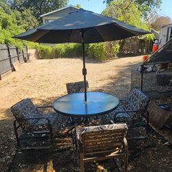Patio Table and 4 chairs $150 OBO